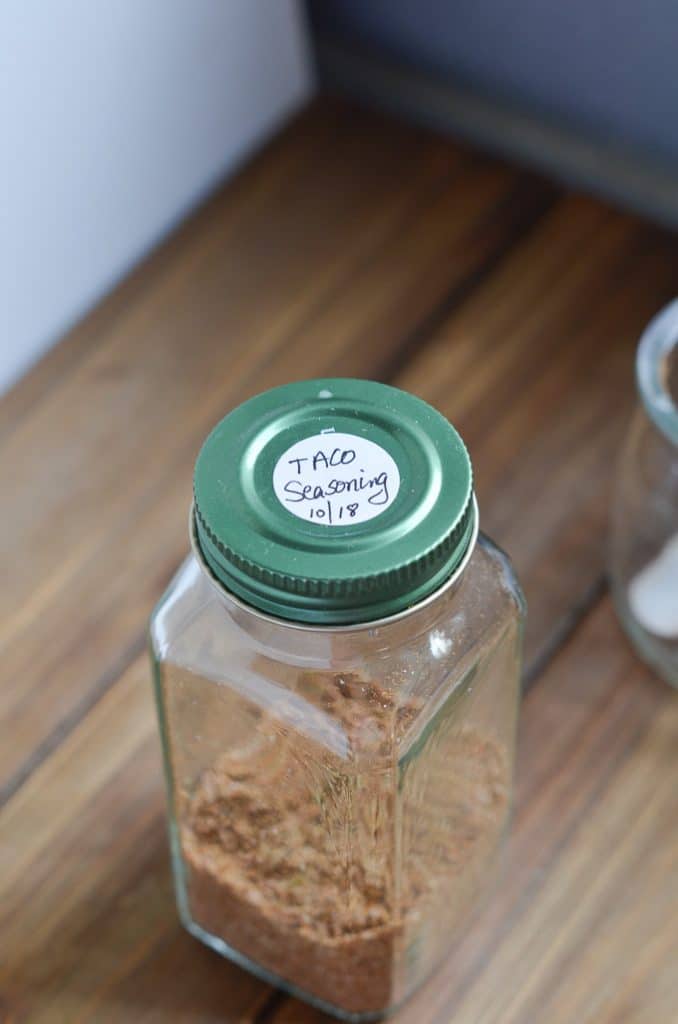 whole30 taco seasoning in spice jar with lid and label.