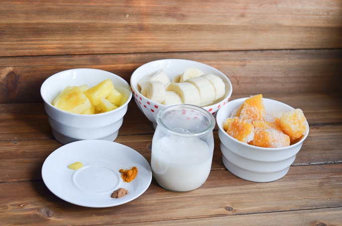 ingredients for turmeric smoothie on counter.