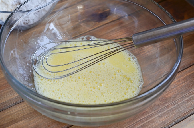 wet ingredients in mixing bowl with whisk.