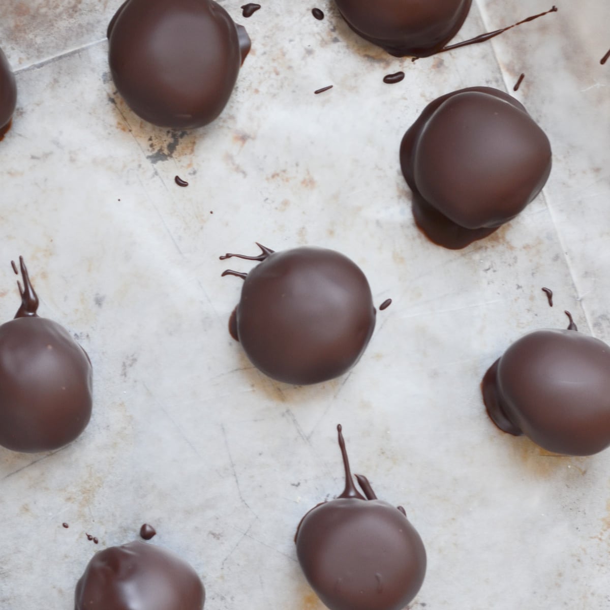 Peanut butter balls coated in melted chocolate.