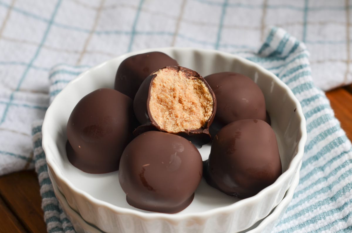 peanut butter balls on a plate.