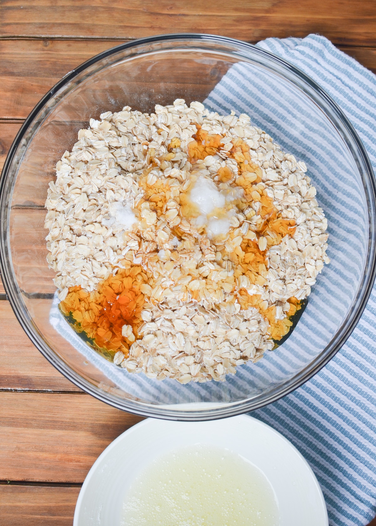 ingredients for gluten-free granola in a mixing bowl.