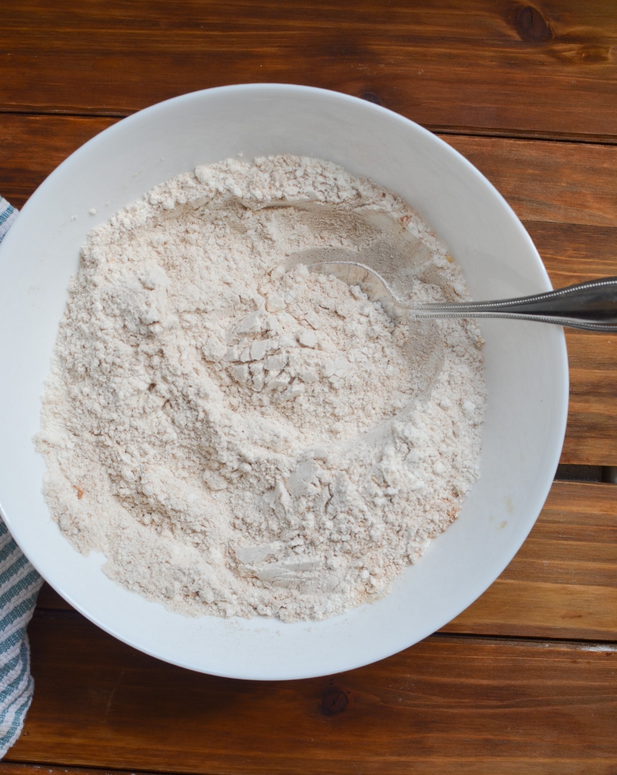 flour and spices whisked together in a bowl.