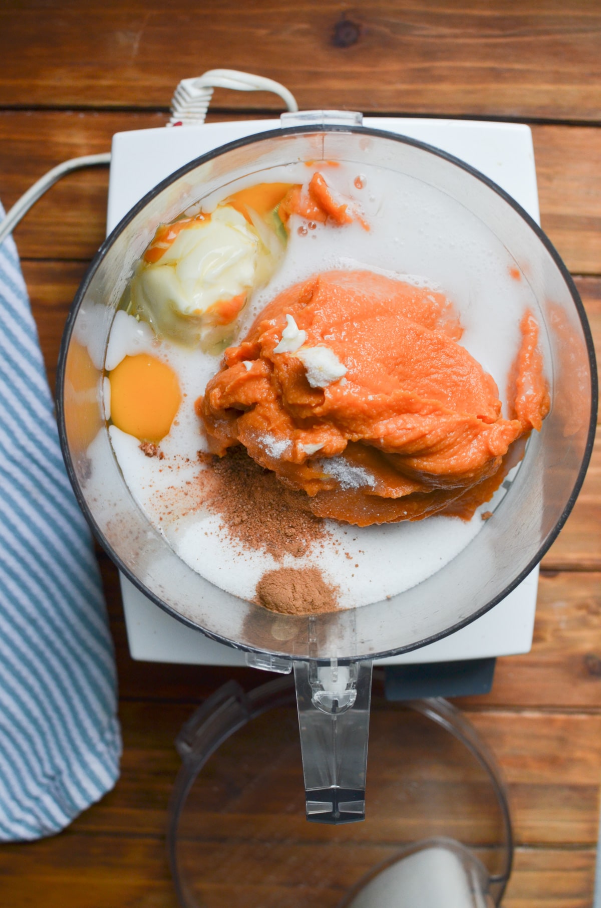 ingredients for sweet potato pie in the food processor.