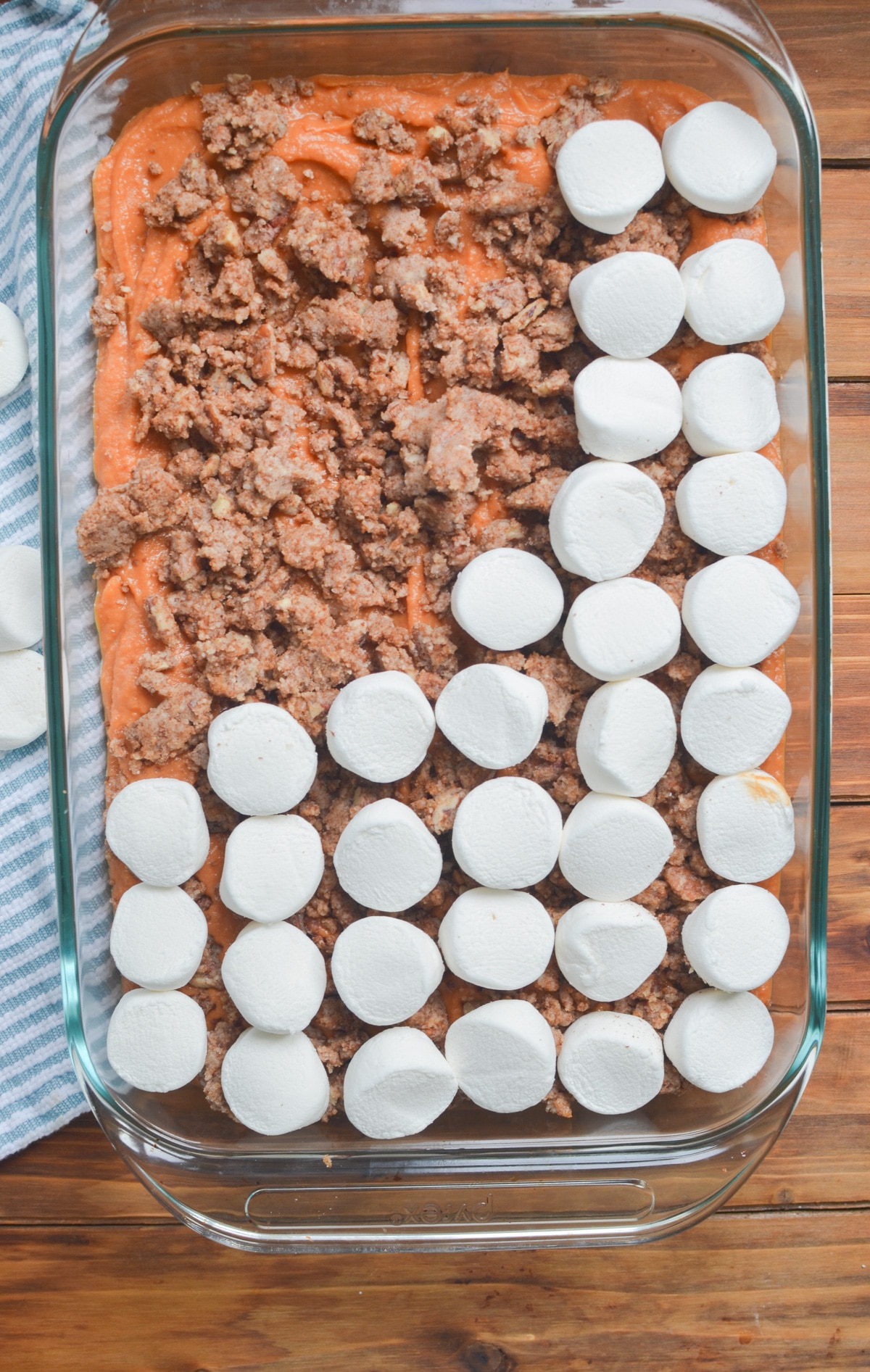 marshmallows over streusel layer in baking pan.