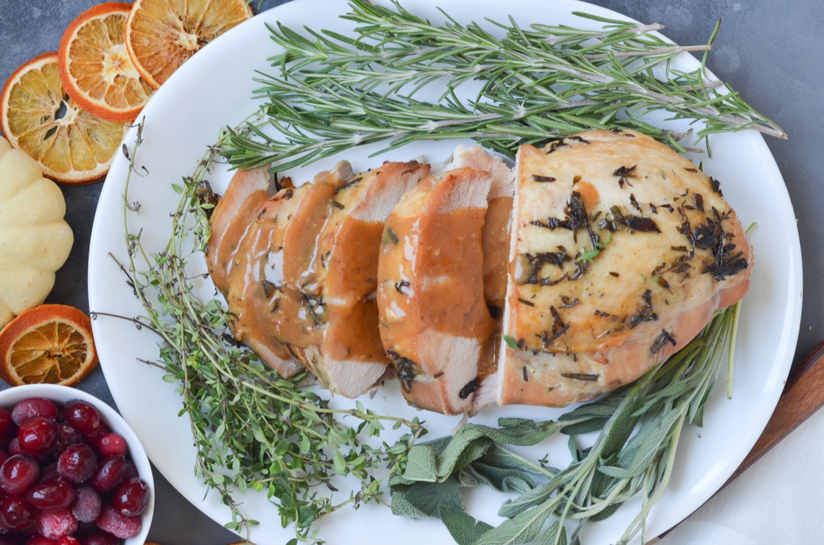 turkey breast with gravy on platter.