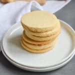 coconut flour cookies stacked on a plate.