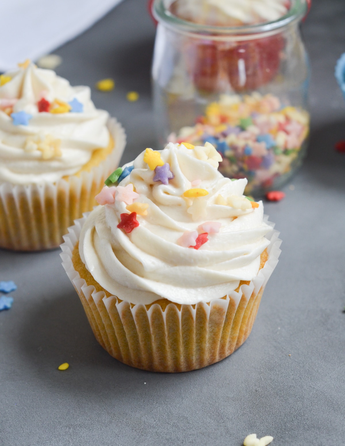 coconut flour cupcakes with frosting and sprinkles