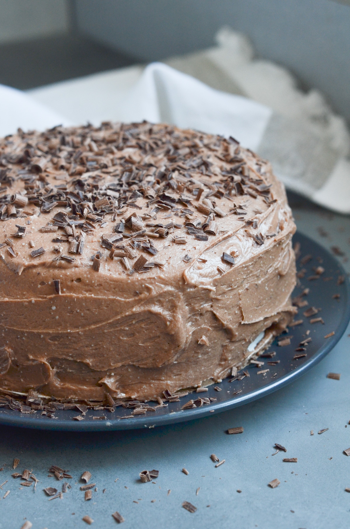 chocolate cake with chocolate frosting and chocolate shavings