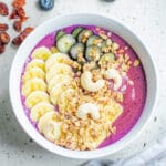 blended blueberry smoothie in the blender.